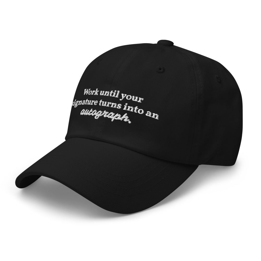 "Work until your signature turns into an autograph." Dad Hat