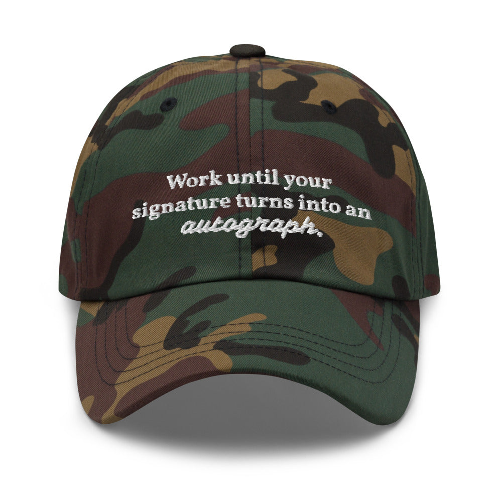 "Work until your signature turns into an autograph." Dad Hat