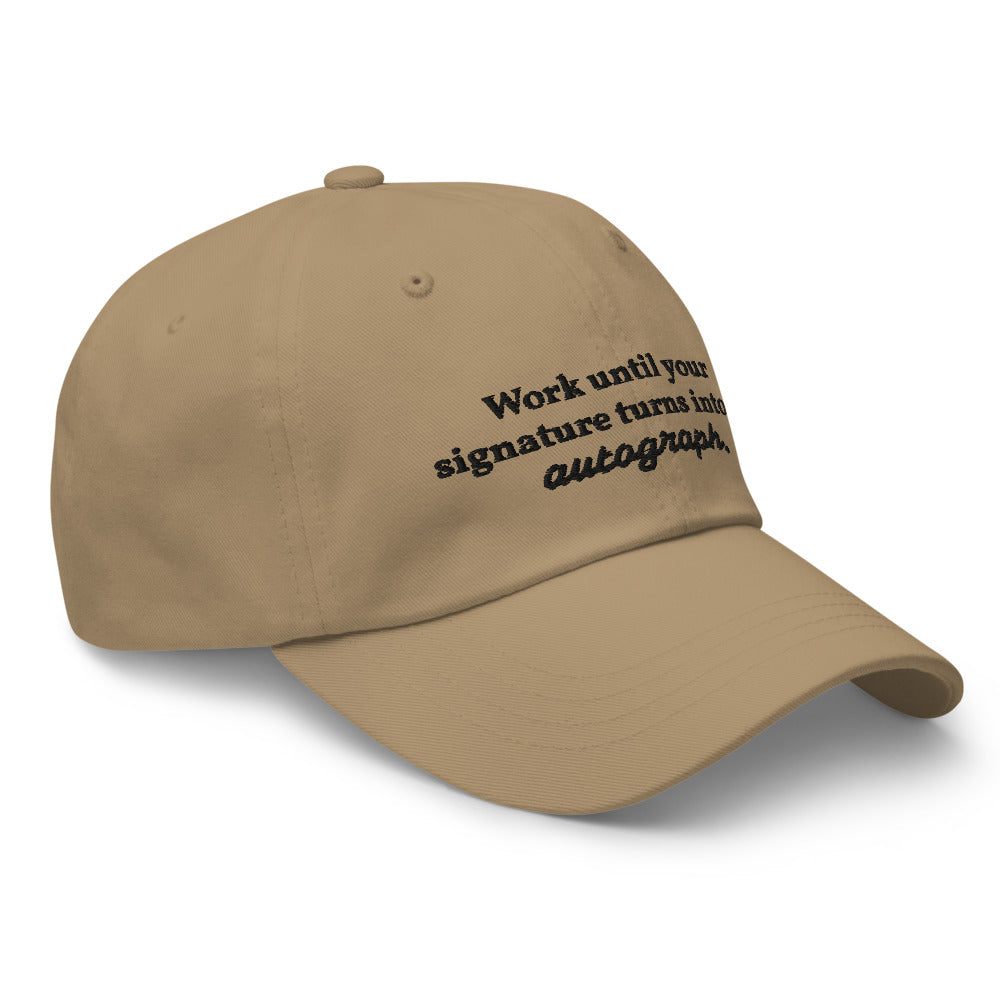 "Work until your signature turns into an autograph." Dad Hat