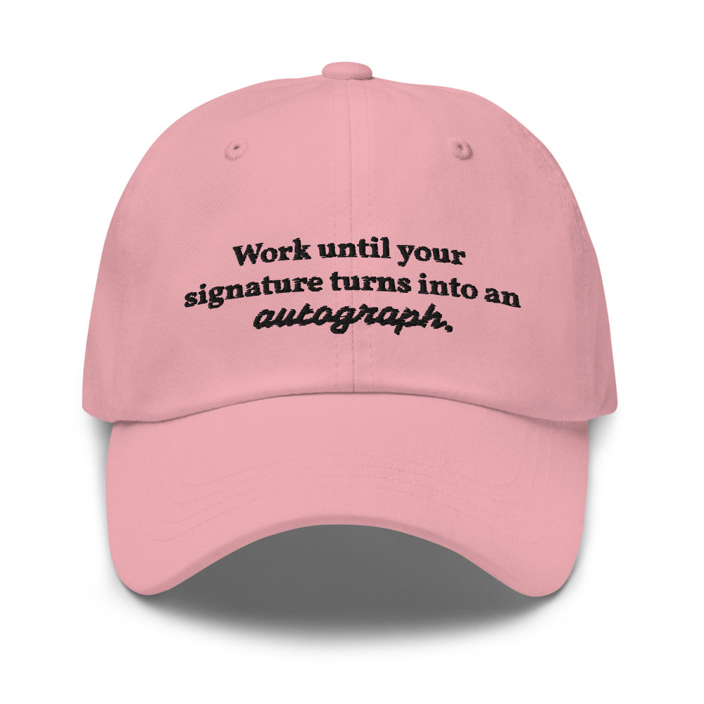 "Work until your signature turns into an autograph." Dad Hat