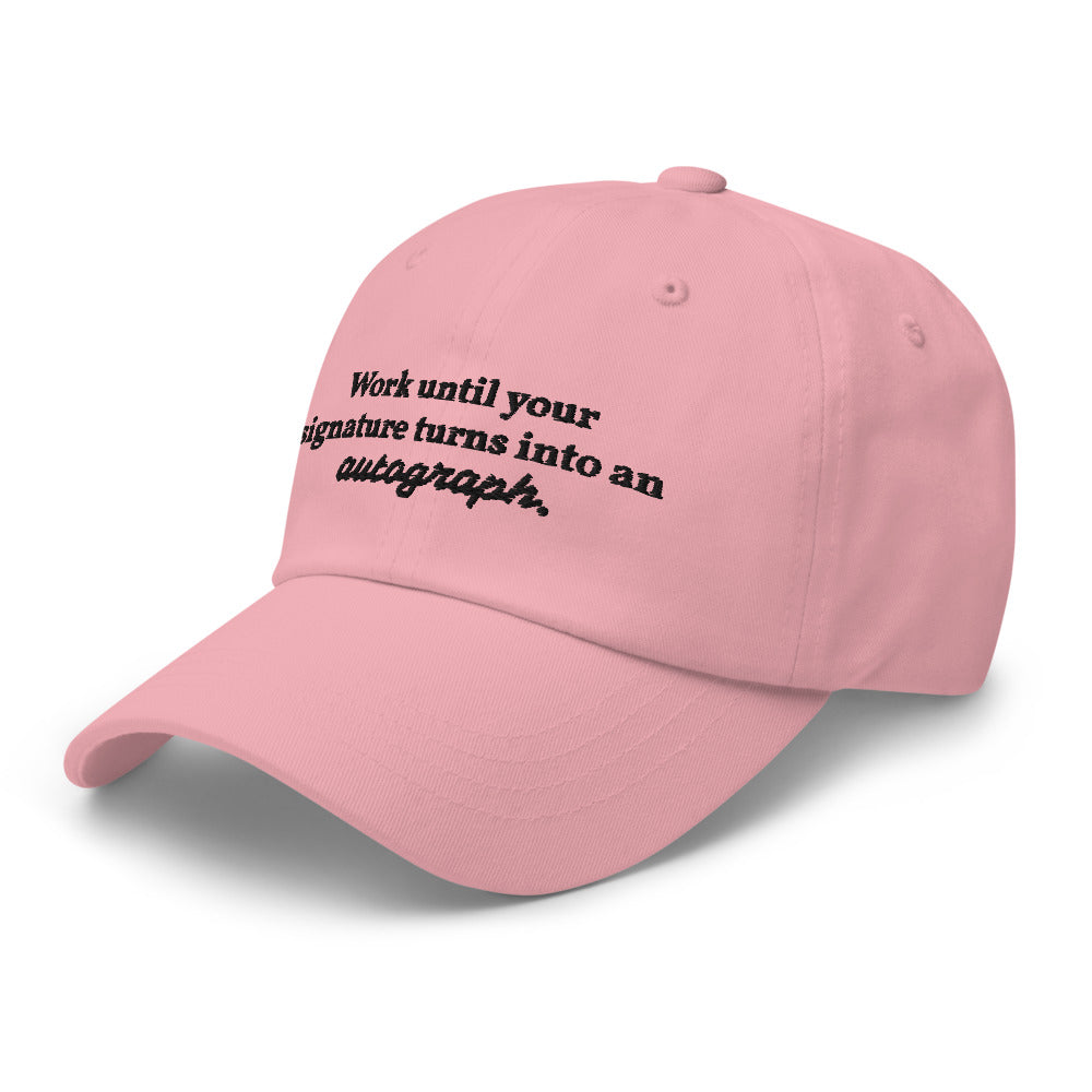 "Work until your signature turns into an autograph." Dad Hat