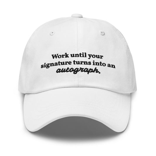 "Work until your signature turns into an autograph." Dad Hat